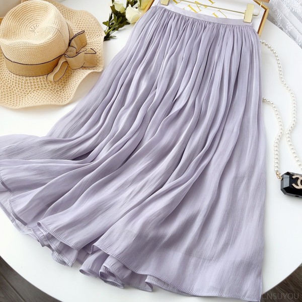 A slimming and figure-hugging summer gauzy dress