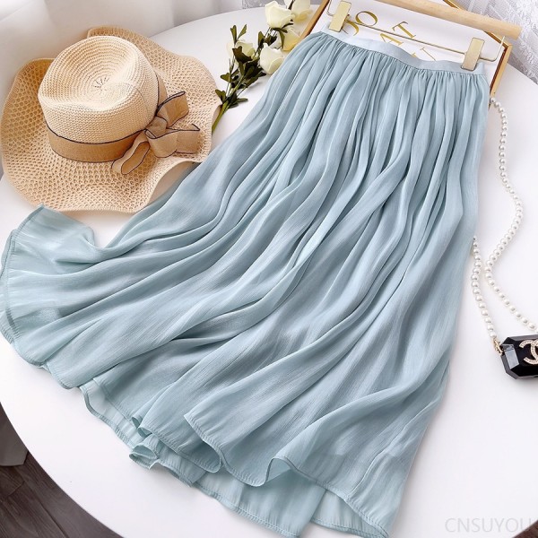 A slimming and figure-hugging summer gauzy dress